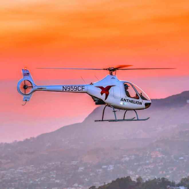 a plane flying over a body of water