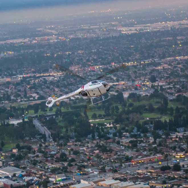 a view of a city with a mountain in the background