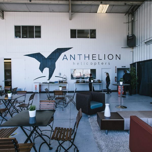 a living room filled with furniture and a table