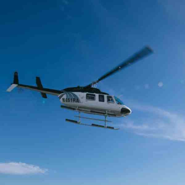 a large passenger jet flying through a blue sky