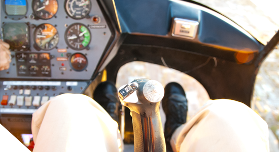 a group of people sitting around a car