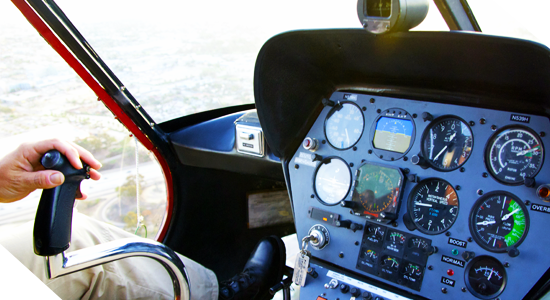 a group of people sitting around a car