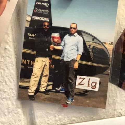 a man standing in front of a building