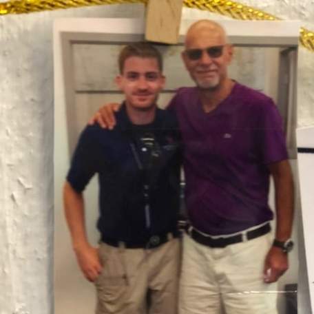 a person standing posing for the camera