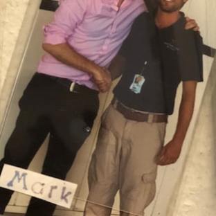 a man and a woman standing in a room