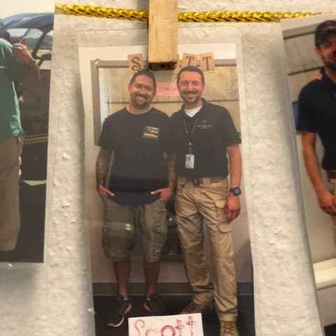 a group of people posing for the camera